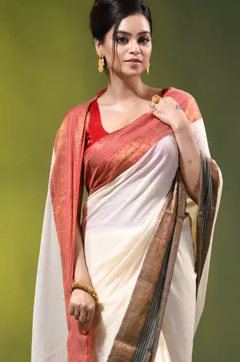 off-white mulmul cotton blend saree with ganga jamuna zari border