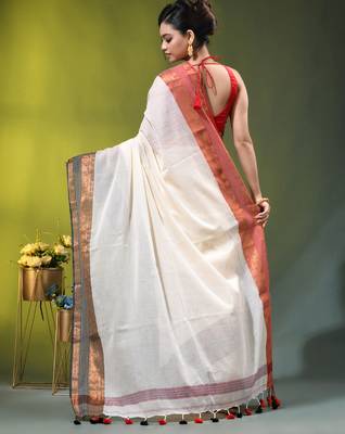 off-white mulmul cotton blend saree with ganga jamuna zari border 4