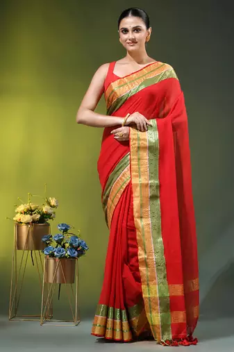 red mulmul cotton blend saree with zari work