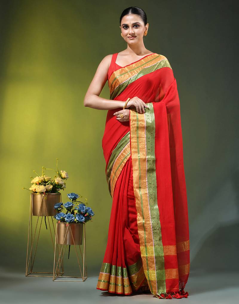 red mulmul cotton blend saree with zari work