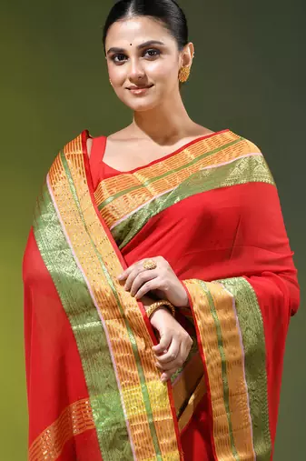 red mulmul cotton blend saree with zari work