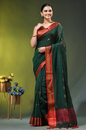 dark green mulmul cotton blend saree with zari work