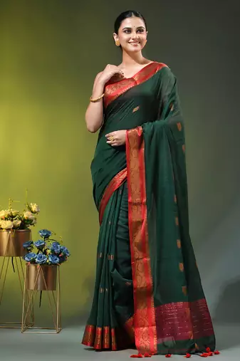 dark green mulmul cotton blend saree with zari work