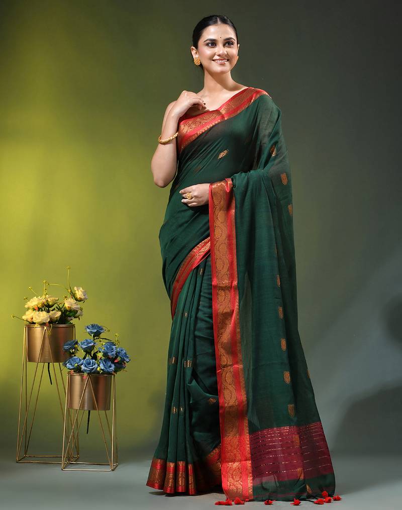 dark green mulmul cotton blend saree with zari work