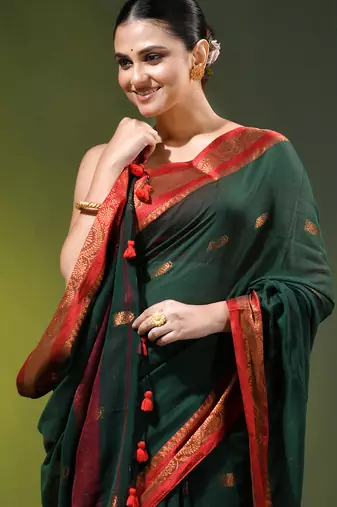 dark green mulmul cotton blend saree with zari work