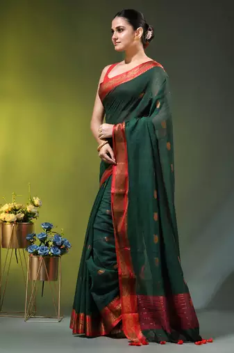 dark green mulmul cotton blend saree with zari work