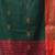dark green mulmul cotton blend saree with zari work