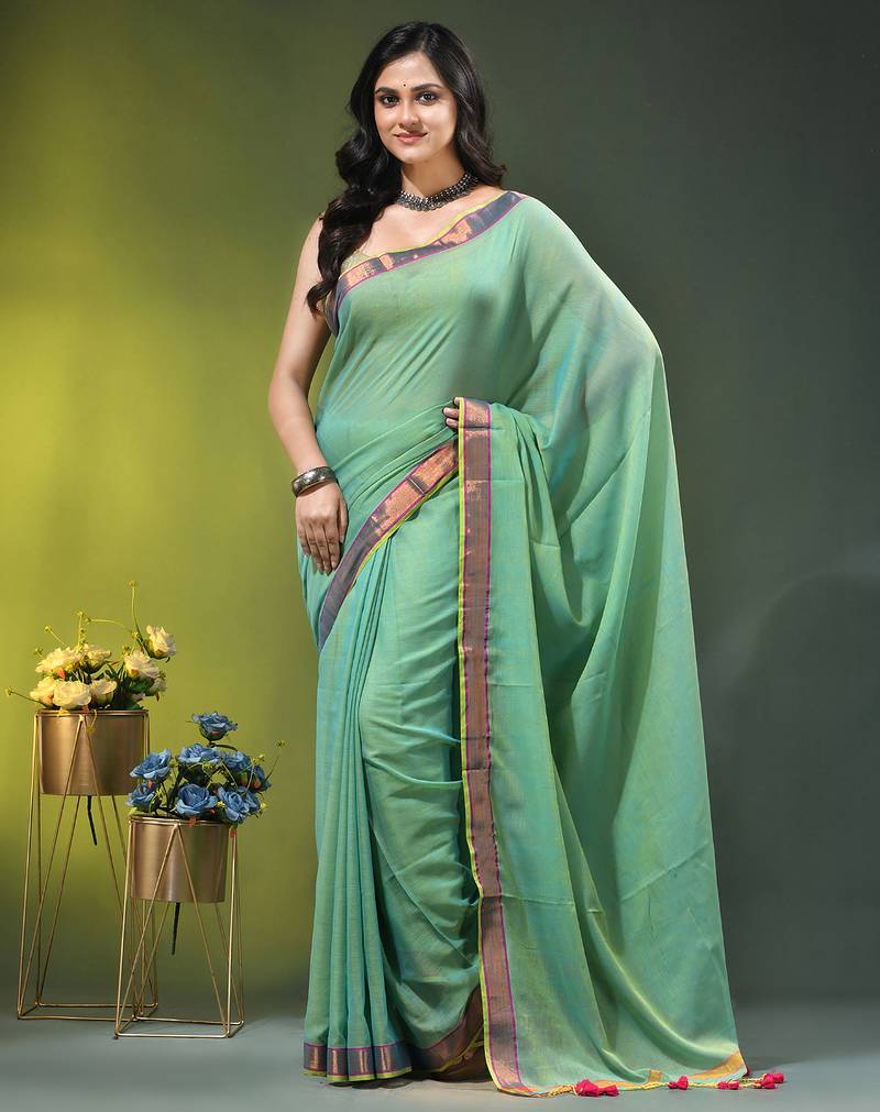 sky blue solid mulmul cotton blend saree with contrast border