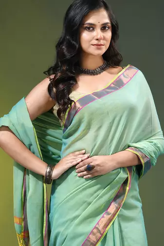 sky blue solid mulmul cotton blend saree with contrast border