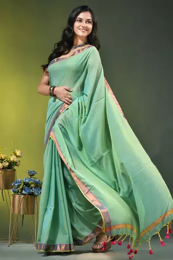 sky blue solid mulmul cotton blend saree with contrast border