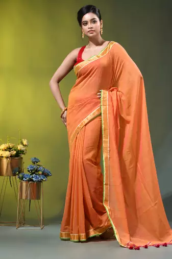 orange solid mulmul cotton blend saree with contrast border