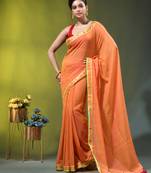 orange solid mulmul cotton blend saree with contrast border