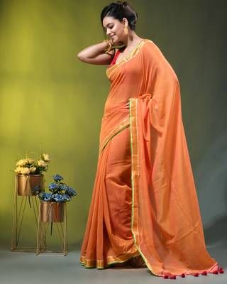 orange solid mulmul cotton blend saree with contrast border 3