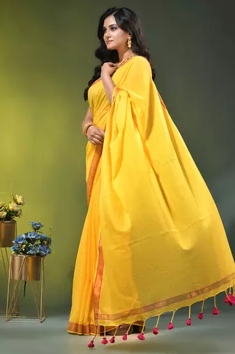 yellow solid mulmul cotton blend saree with contrast border