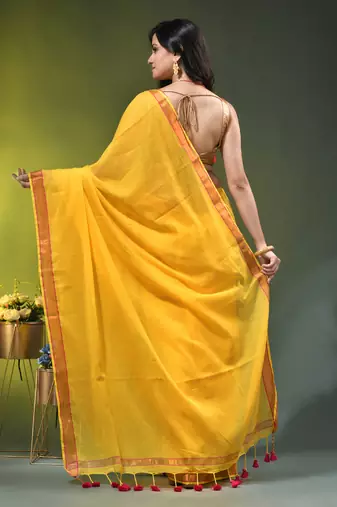 yellow solid mulmul cotton blend saree with contrast border