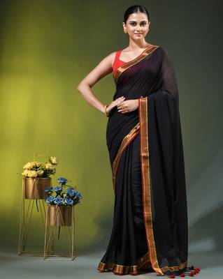 black solid mulmul cotton blend saree with contrast border 1