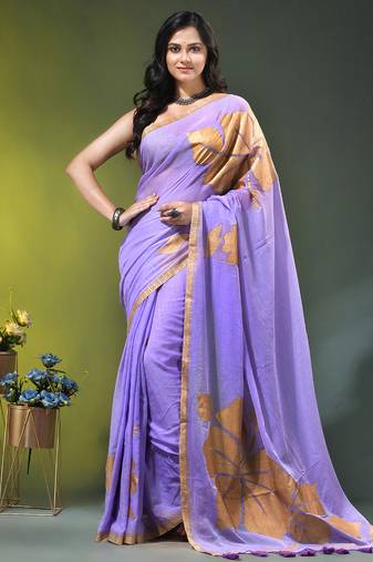 lilac mulmul cotton blend saree with golden hibiscus foil print