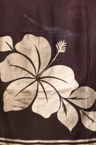 brown mulmul cotton blend saree with golden hibiscus foil print