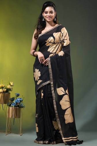 black mulmul cotton blend saree with golden hibiscus foil print