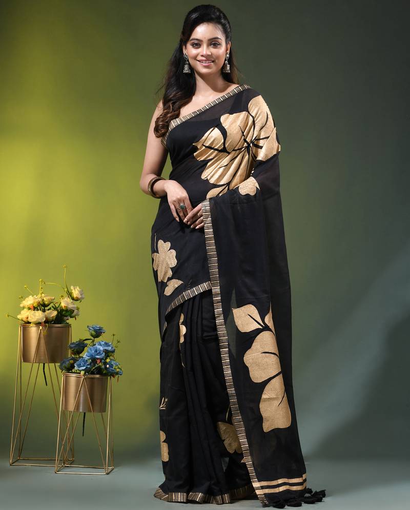 black mulmul cotton blend saree with golden hibiscus foil print