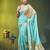 sea green mulmul cotton blend saree with golden hibiscus foil print