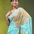sea green mulmul cotton blend saree with golden hibiscus foil print