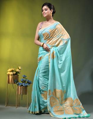 sea green mulmul cotton blend saree with golden hibiscus foil print 3