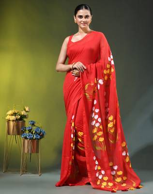 red mulmul saree with painted floral motifs 1