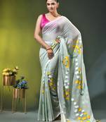 sage green mulmul saree with painted floral motifs