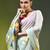 sage green mulmul saree with painted floral motifs