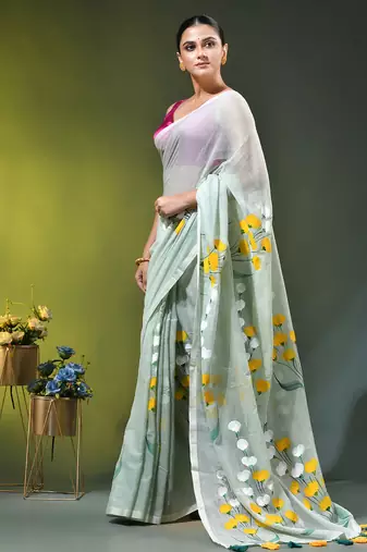 sage green mulmul saree with painted floral motifs