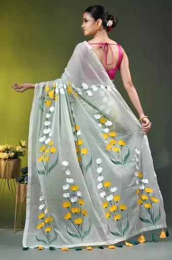sage green mulmul saree with painted floral motifs