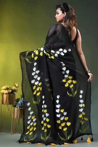 black mulmul saree with painted floral motifs