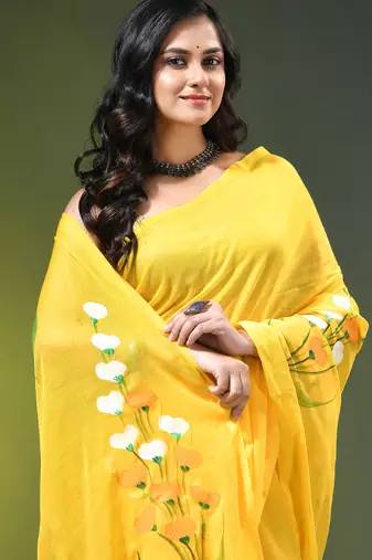 yellow mulmul saree with painted floral motifs