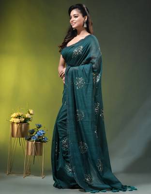 teal mulmul cotton blend saree with lotus sequin work 3