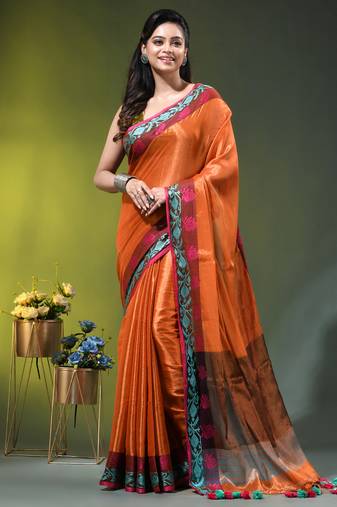Orange tissue saree with rose woven border