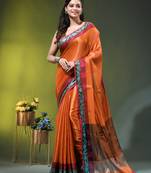 Orange tissue saree with rose woven border