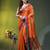 Orange tissue saree with rose woven border