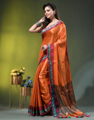 Orange tissue saree with rose woven border 2