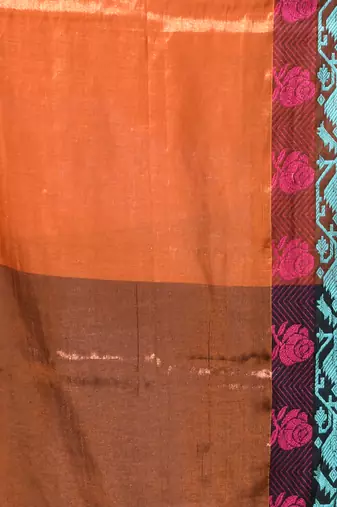 Orange tissue saree with rose woven border