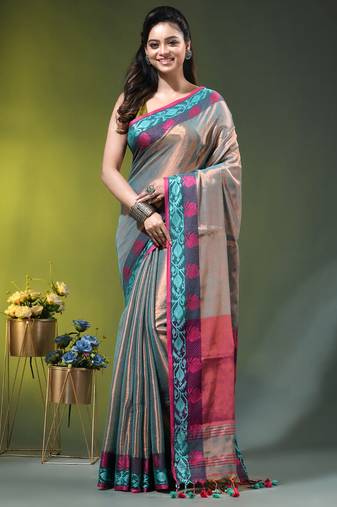 Sea green tissue saree with rose woven border