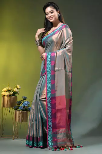 Sea green tissue saree with rose woven border