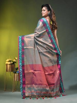 Sea green tissue saree with rose woven border 3