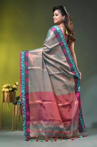 Sea green tissue saree with rose woven border