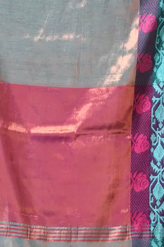 Sea green tissue saree with rose woven border