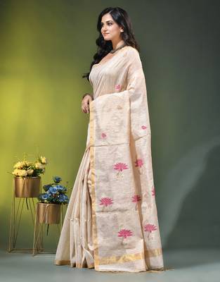 Off white tissue saree with lotus woven design 2