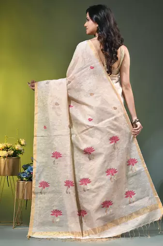 Off white tissue saree with lotus woven design