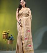 Beige tissue saree with lotus woven design