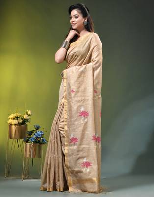 Beige tissue saree with lotus woven design 2