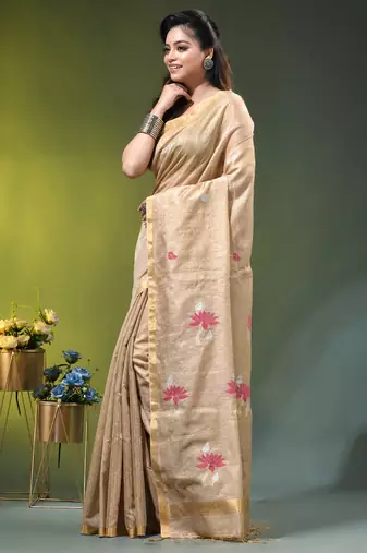 Beige tissue saree with lotus woven design